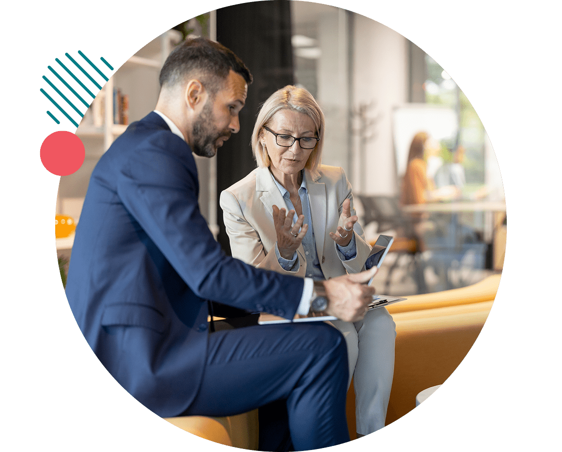 business partners looking at data