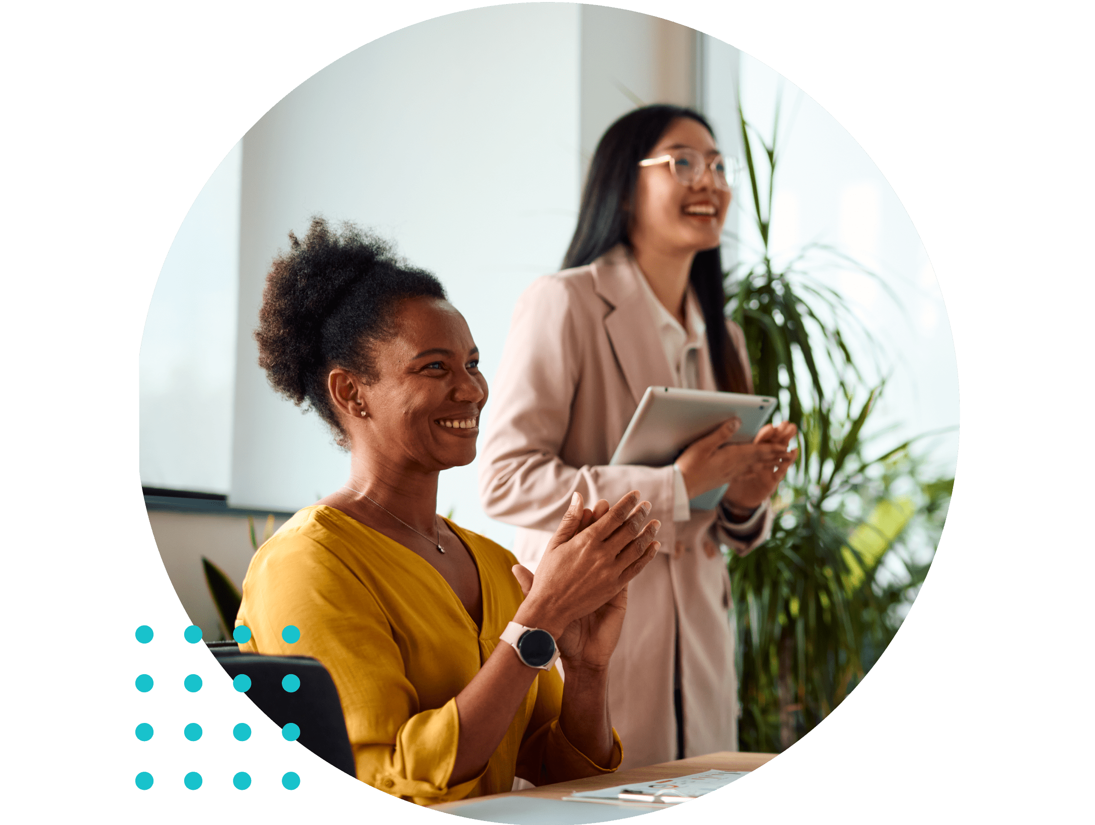 Business team applauding during a meeting in the office